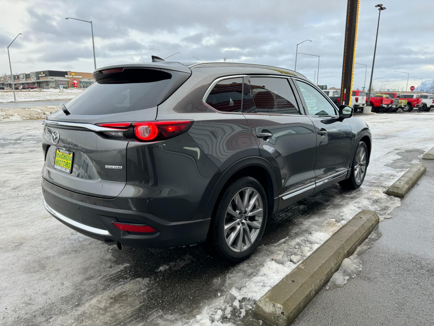 2021 Gray /Black Mazda CX-9 Grand Touring AWD (JM3TCBDY5M0) with an 2.5L L4 DOHC 16V engine, 6A transmission, located at 1960 Industrial Drive, Wasilla, 99654, (907) 274-2277, 61.573475, -149.400146 - Photo#5